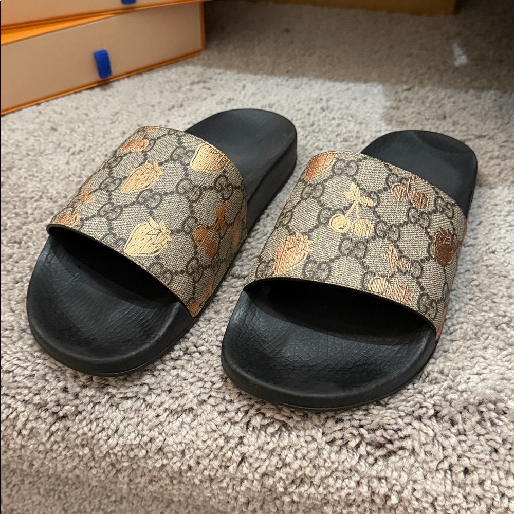 Gucci Black and Brown Slides with Gold Accents